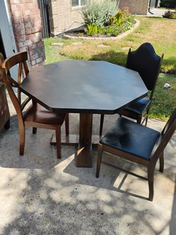 Dinner table with chairs