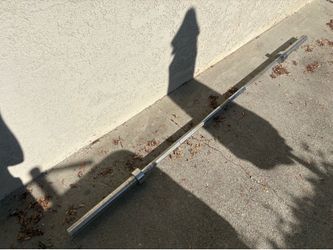 Olympic Bar with springs and non weighted barbells