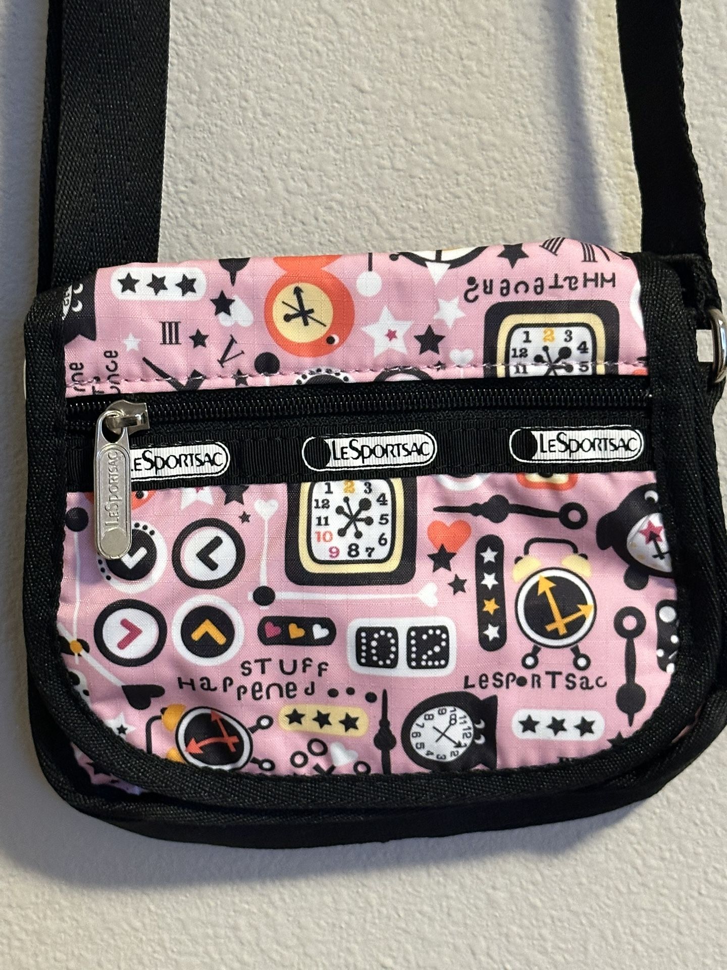 New without tags LeSportsac Mini Crossbody Pink Tick Tic Clock Bag Purse Black Adjustable Strap