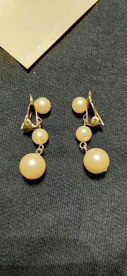 gold tone clip-on earrings with pearl-like accents