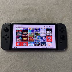 NINTENDO SWITCH OLED Model with 120 Switch Games 