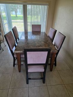 Granite top table with 6 chairs