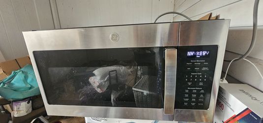 $250- OBO- OVER THE RANGE MICROWAVE - $250 OBO