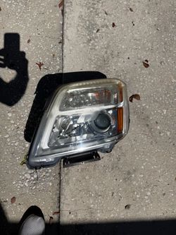 2014 GMC Terrain drivers side headlight