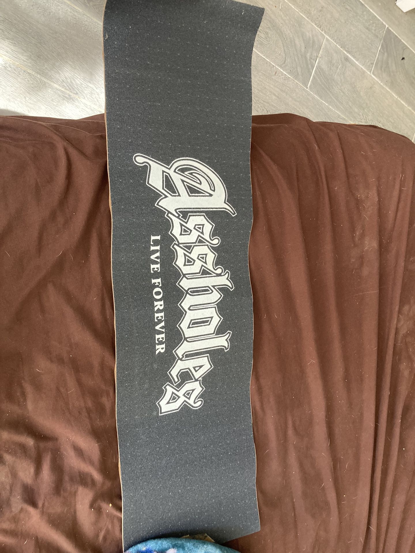 Assholes Live Forever Grip tape