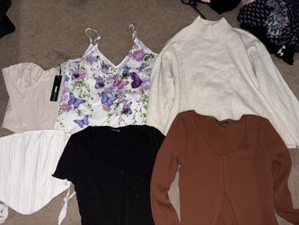 Lot of women's tops in various colors