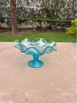 Blue ruffled glass pedestal compote bowl