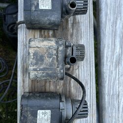 Three small fountain pumps