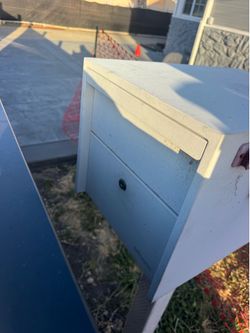 Mail box with wooden post