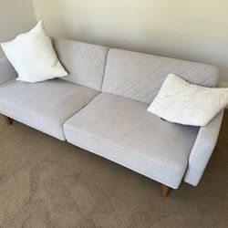 Gray Futon And Cushions