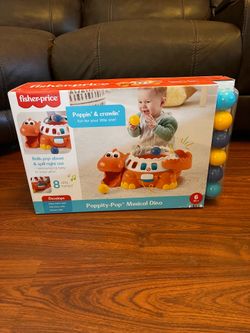 FISHER PRICE POPPITY POP MUSICAL DINO