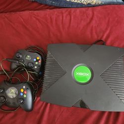 original xbox and 6 games and 2 controllers works great