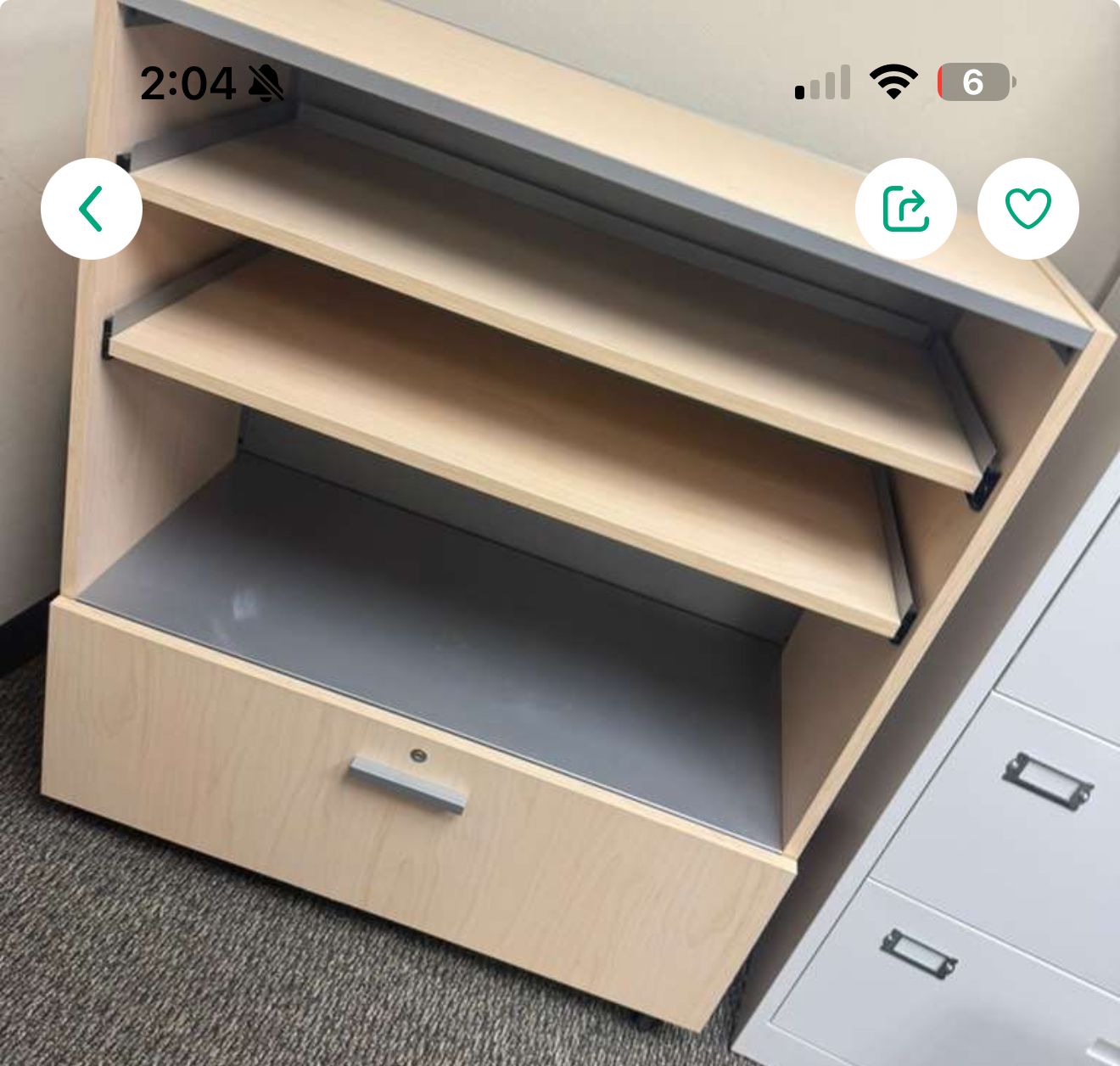 filing cabinet with one drawer and two adjustable shelves.
