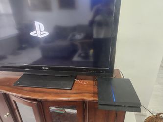 1 TB PS4 Slim + 2 Controllers + 4 Games — $160 cash, ready today