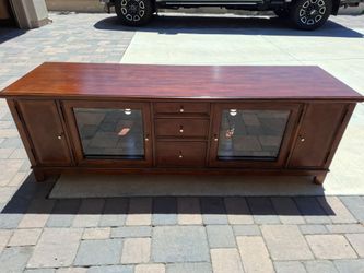 Solid wood TV console.