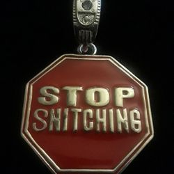 Stop Snitching pendant. Brand New. I will include a free chain with each pendant purchased. ONLY $30.