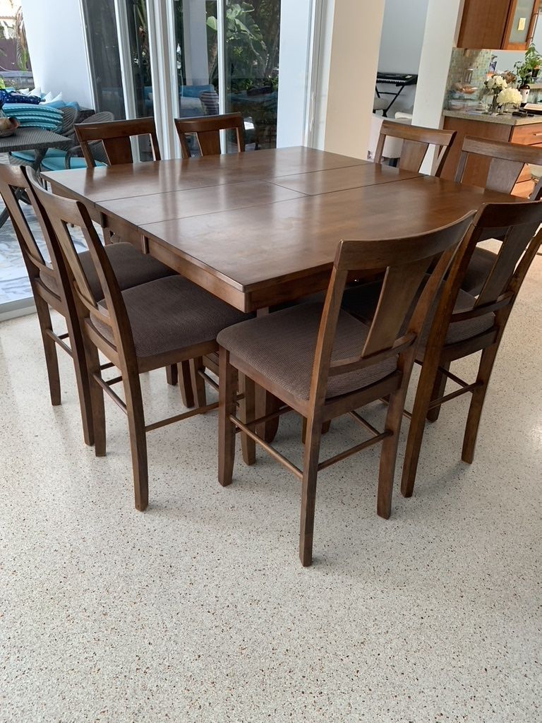 PRICED TO SELL!! $450 Or Best Offer Counter Height Extendable Wood Dining Table Includes 8 Counter Height Barstools