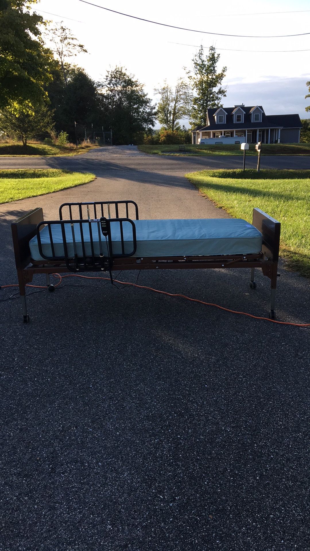 Adjustable bed with mattress