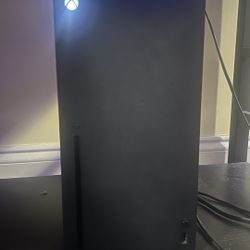Xbox Series X console with controller 