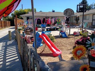 Big yard sale. Bags of clothes. For almost nothing