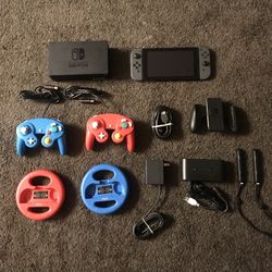 NINTENDO SWITCH with 100 SWITCH GAMES and Many Extras