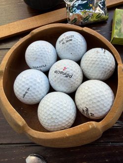 Golf balls 7 of them Brand names