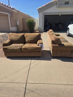 Free pair of tan couches