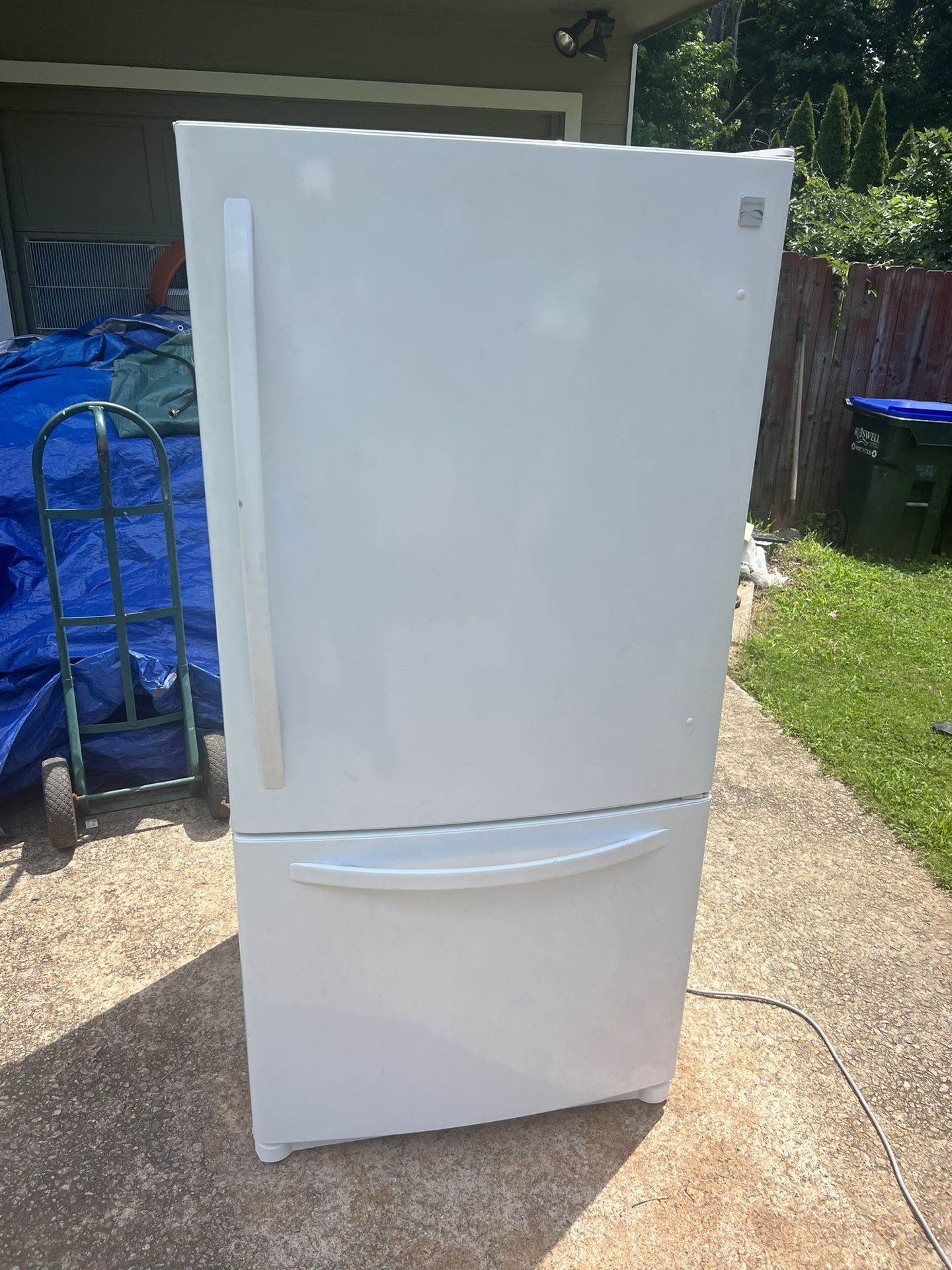 White Kenmore refrigerator and freezer
