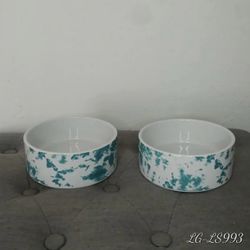 Paw and tail tie dye pets food and water bowls. 