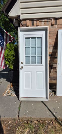 32x80 back door with bars and miniblinds built in glass. Framed ready to install