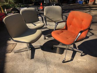 3 tan vintage Pollock style office chairs