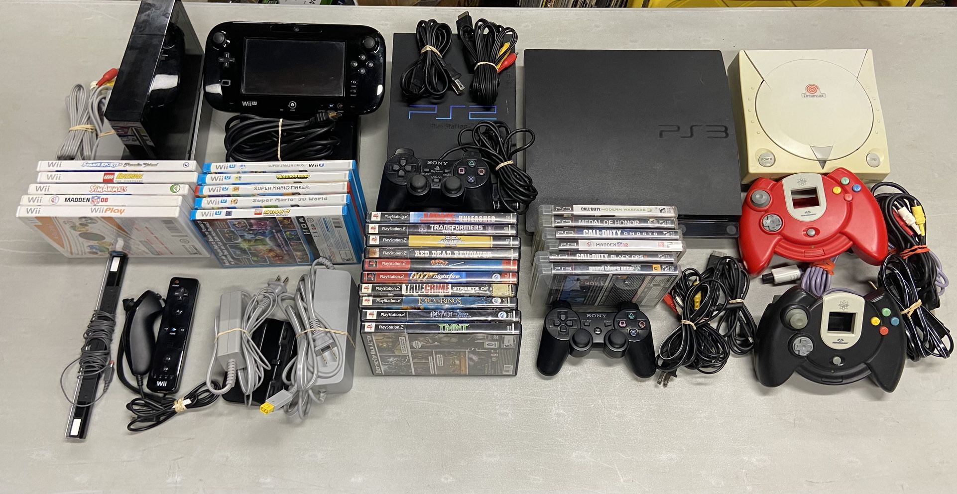 Video Game Bundle For Sale $550. OBO. (5 Consoles And 26 Games) Nintendo Wii, Wii U, Sega Dreamcast, PlayStation 2 & 3.  