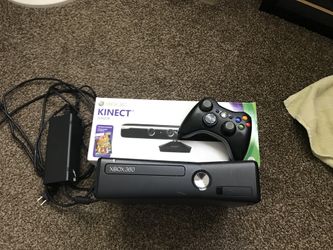 Xbox 360 slim w/HDMI, Kinect, and controller with a game included. Comes with GTA 5