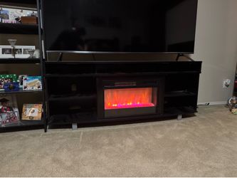 Entertainment center with fireplace