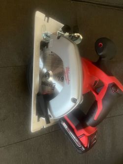 Milwaukee Skil saw with battery
