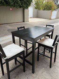 Bar height table with 4 chairs 25” height