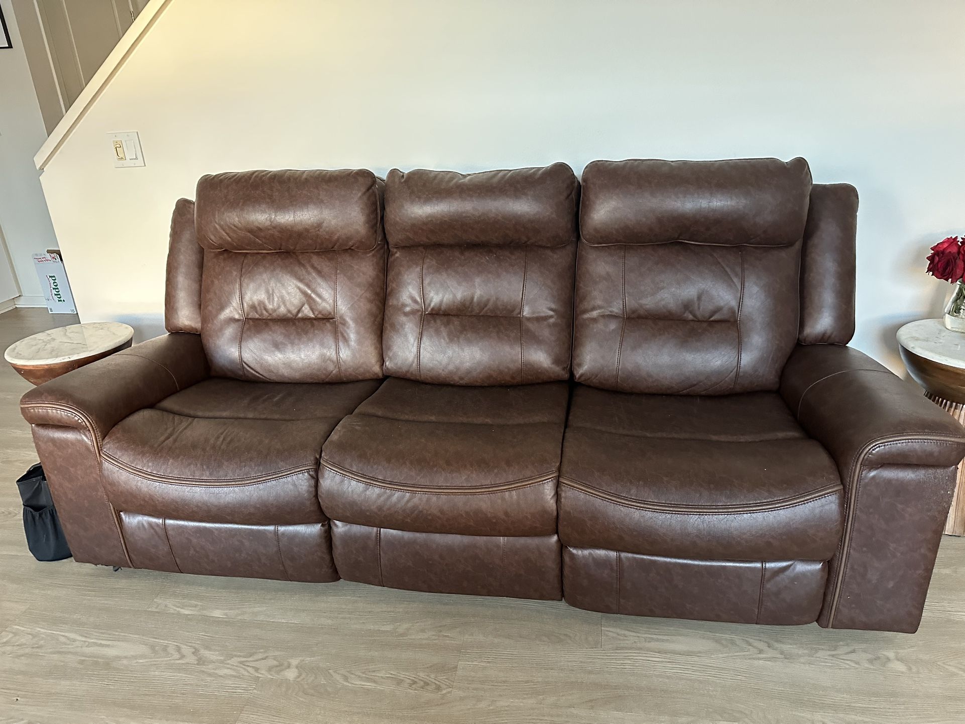 Recliner couch with chargers on the side