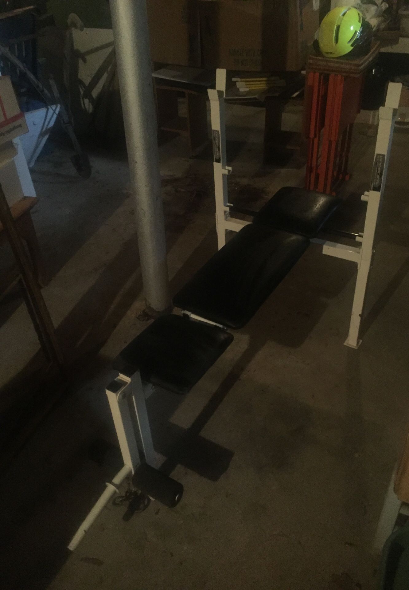 Bench press with barbells and weights