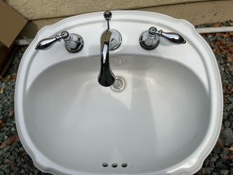 Kohler vanity sink And Price Pfister faucet and tub and shower