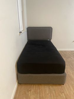 Twin  bed with bed frame