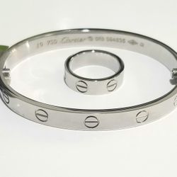 A set of Silver Love Bracelet and ring.
6mm Bracelet size 16 -21cm.
Ring 6 To 11 Gift