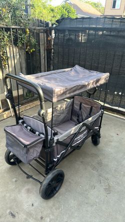 Carrito para cargar niños o cosas muy grande y fuerte llantas anchas atrás y con sombra dos cinturones de seguridad para niños