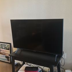 Samsung 43-inch Crystal UHD 4K Smart TV featuring a 3840 x 2160 resolution, HDR10+ support, and Tizen OS for streaming