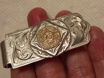 Silver and gold money clip