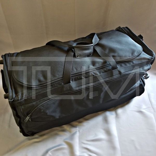 used tumi bag