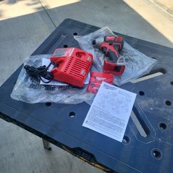Milwaukee Charger and 1/4 hex Impact driver