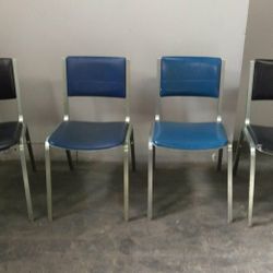 4 vintage stacking Steel Case mid century industrial chairs