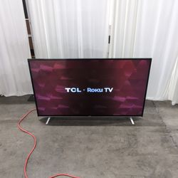 TCL-Slim Black Flat Screen TV with White Back