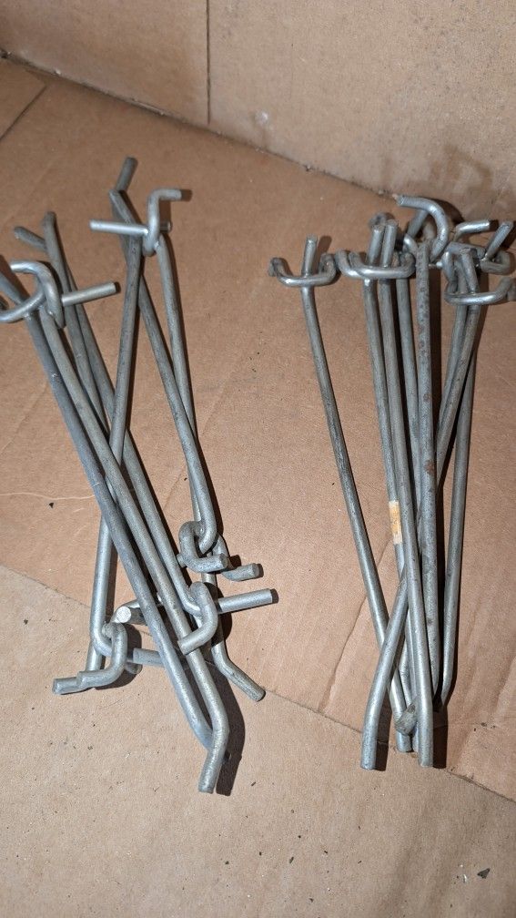 Heavy Duty Peg Board L-Shaped Hooks Various Sizes Of Light Weight Ones Too. Some Are 8" Or 12" Long. What Are You Looking For?
