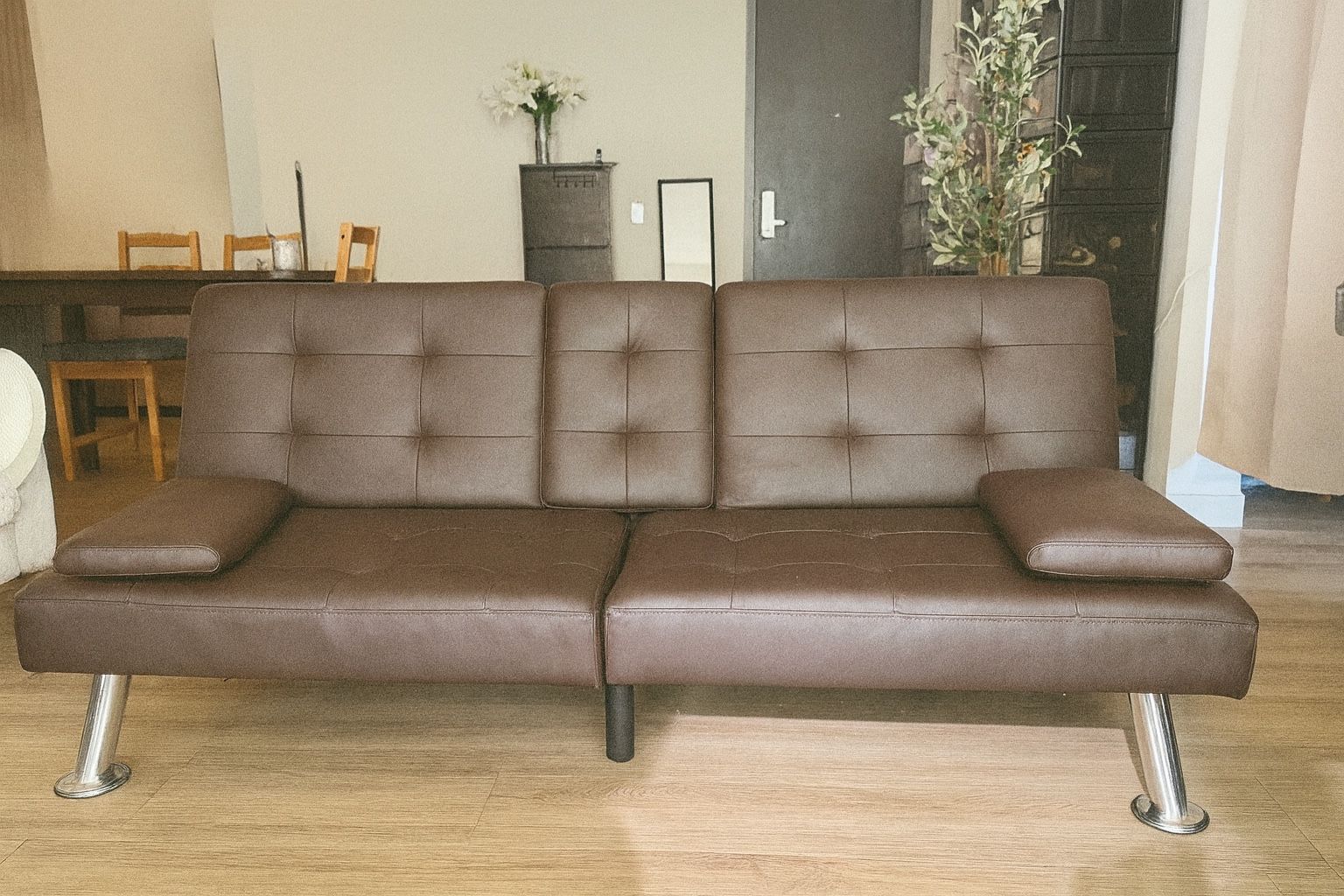 Brown Futon Sofa Bed Faux Leather- yes it’s available